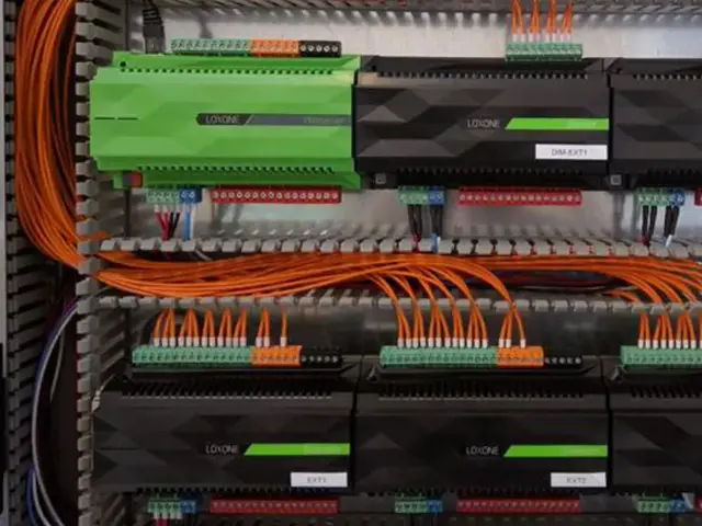 Loxone server cabinet with multiple dim extensions for lighting