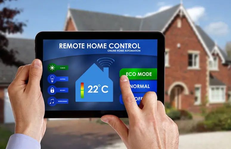 Hands holding a tablet with a smart home app