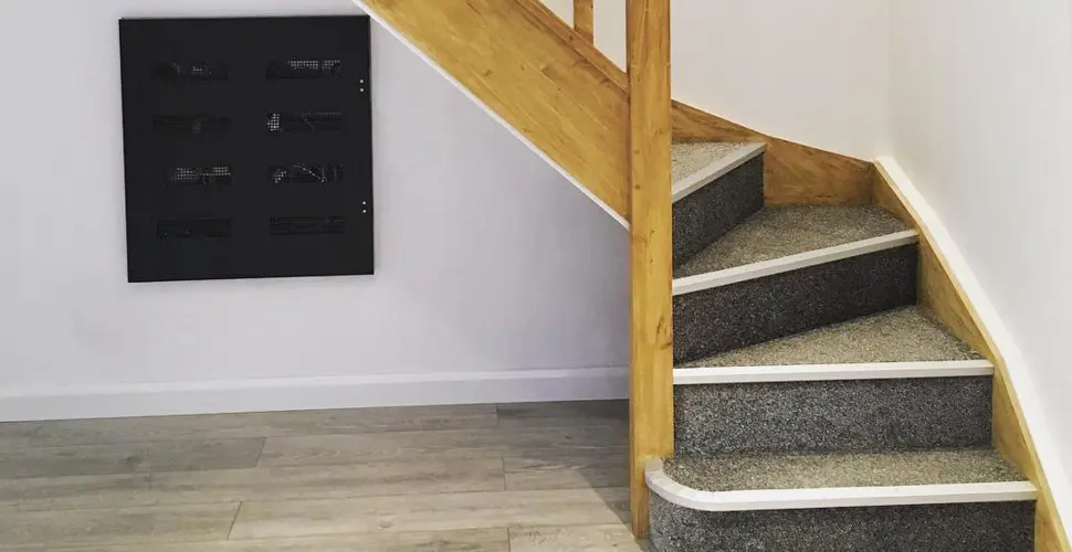 Recessed Loxone cabinet under stairs