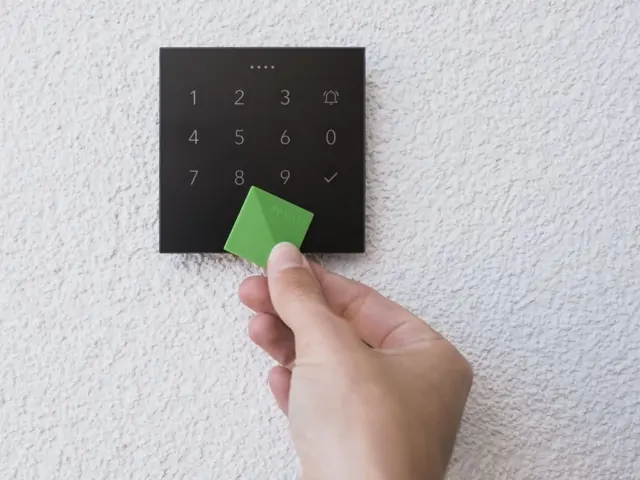 Unlocking a front door with an NFC tag on a Loxone NFC Code Touch reader