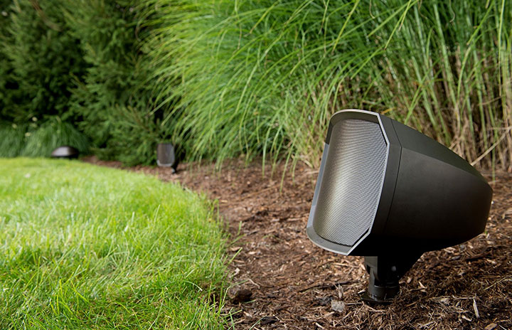 Outdoor speaker on edge of grass