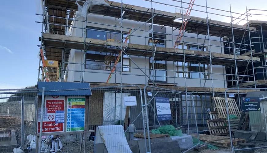 Graven hill house build project with scaffolding