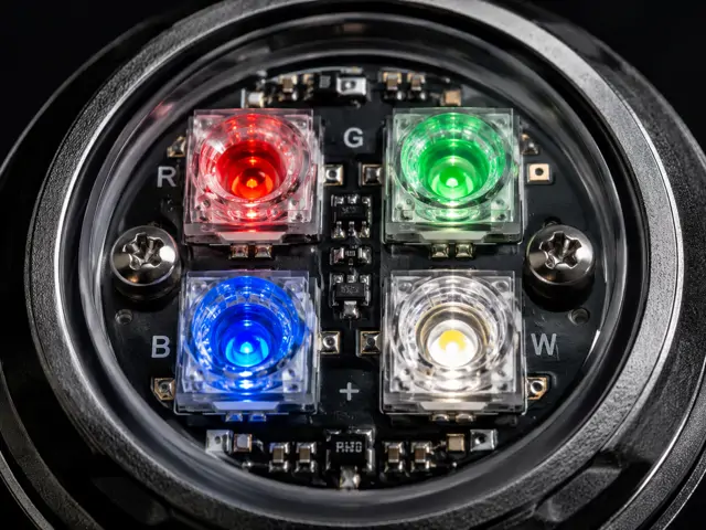 Close-up of an RGBW LED spotlight showing red, green, blue and white diodes